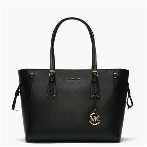 michael kors bag black tote|michael kors black leather bag.